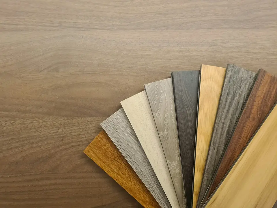 Waterproof oak-look vinyl plank flooring in a finished Massachusetts basement
